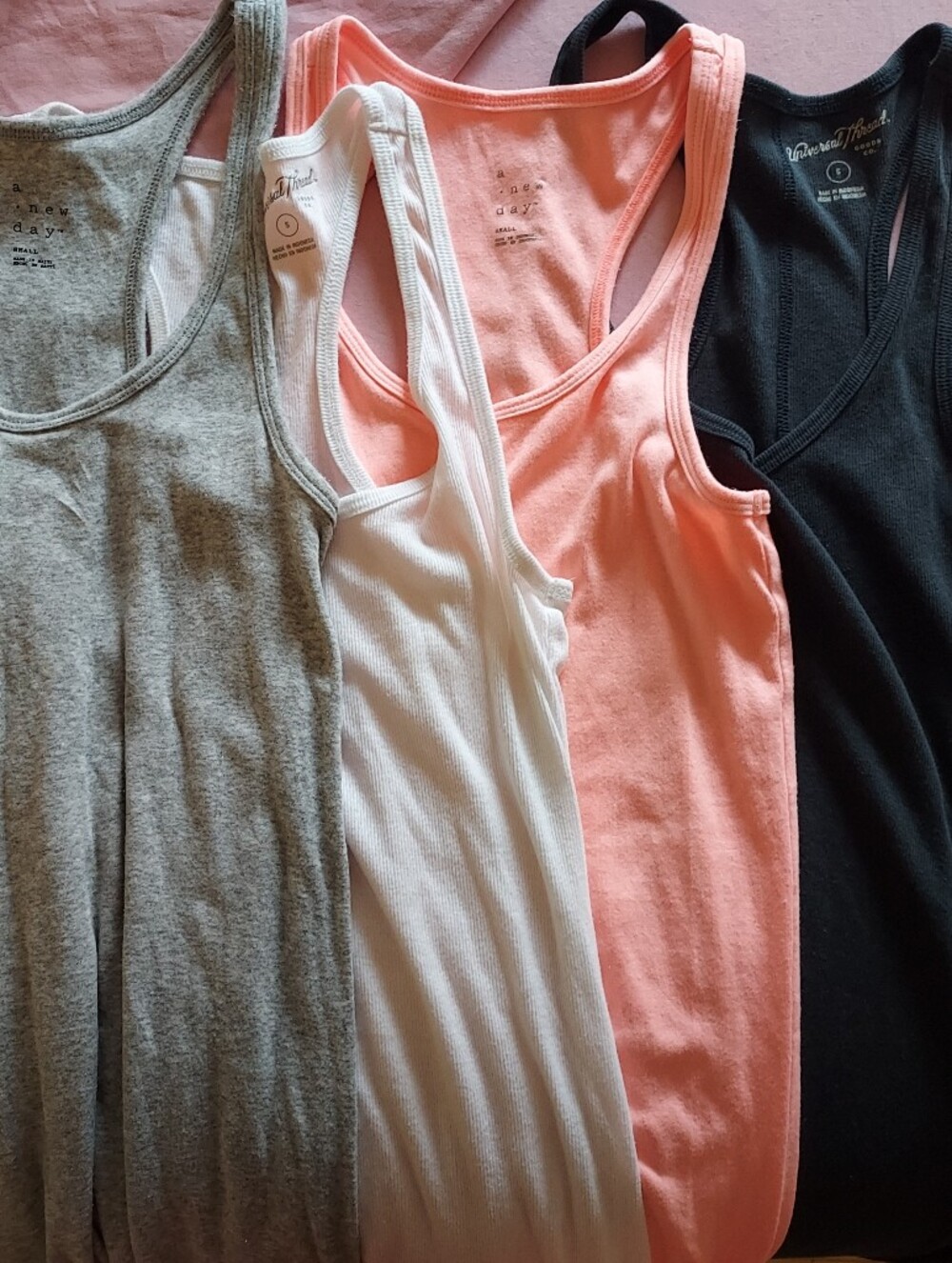 4 Womens Racerback Tanks. 2 Universal Thread. 2 A New Day. Perfect for everyday